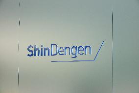 Shindengen Electric Manufacturing sign and logo